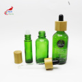green custom cream glass jar glass pump spray lotion oil toner bottle with bamboo cap BJ-245B
